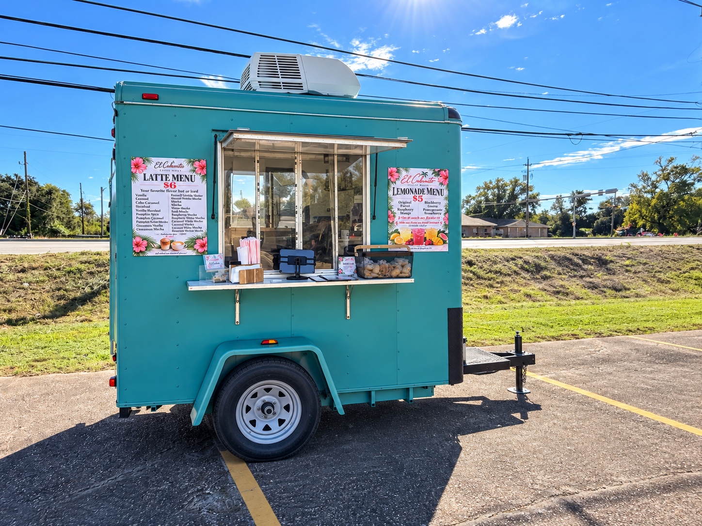 El Cubanito’s teal coffee trailer at a sunny outdoor location